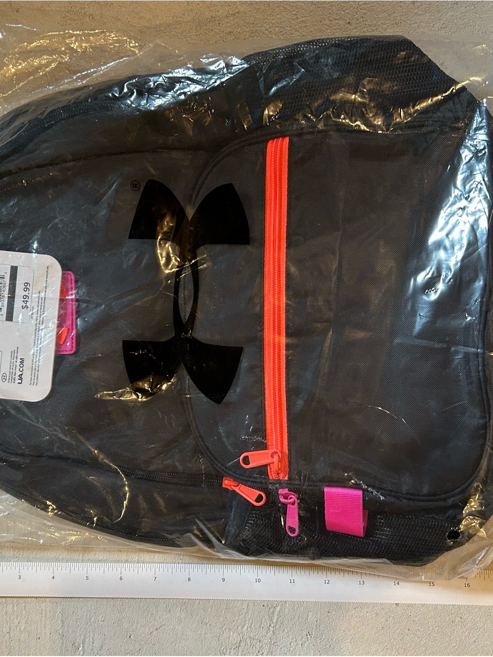 Under Armour Black Backpack with Neon Orange Zipper and Pink Pulls